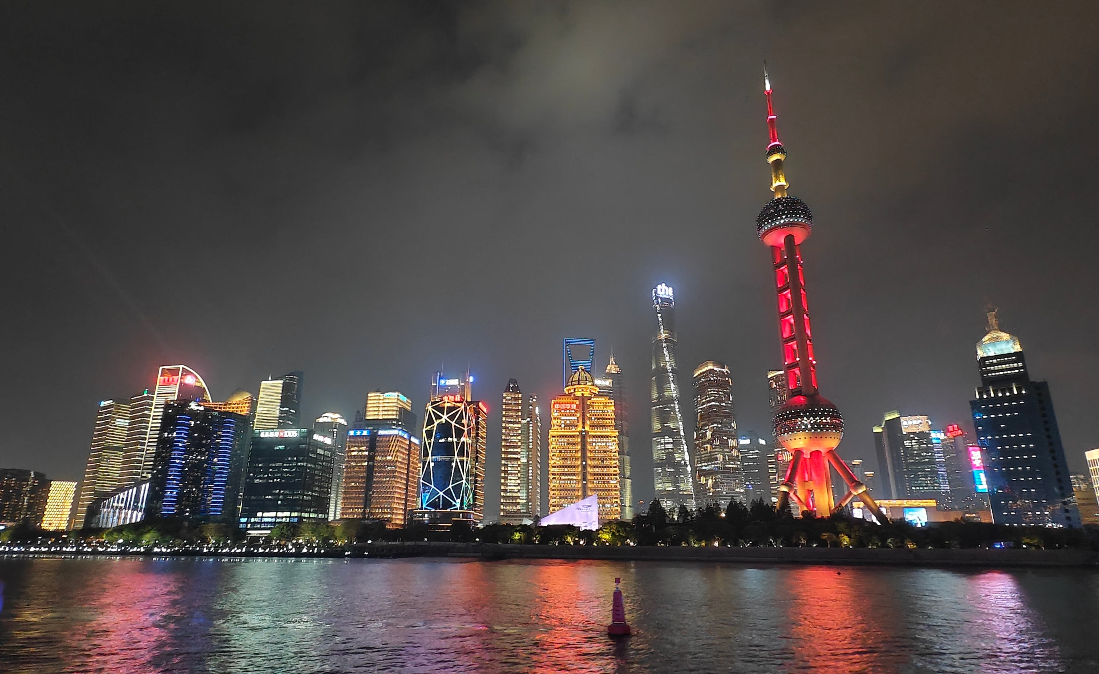 Shanghai’s Pudong skyline seen from across the Huangpu River at night